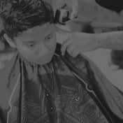 Barber styling hair